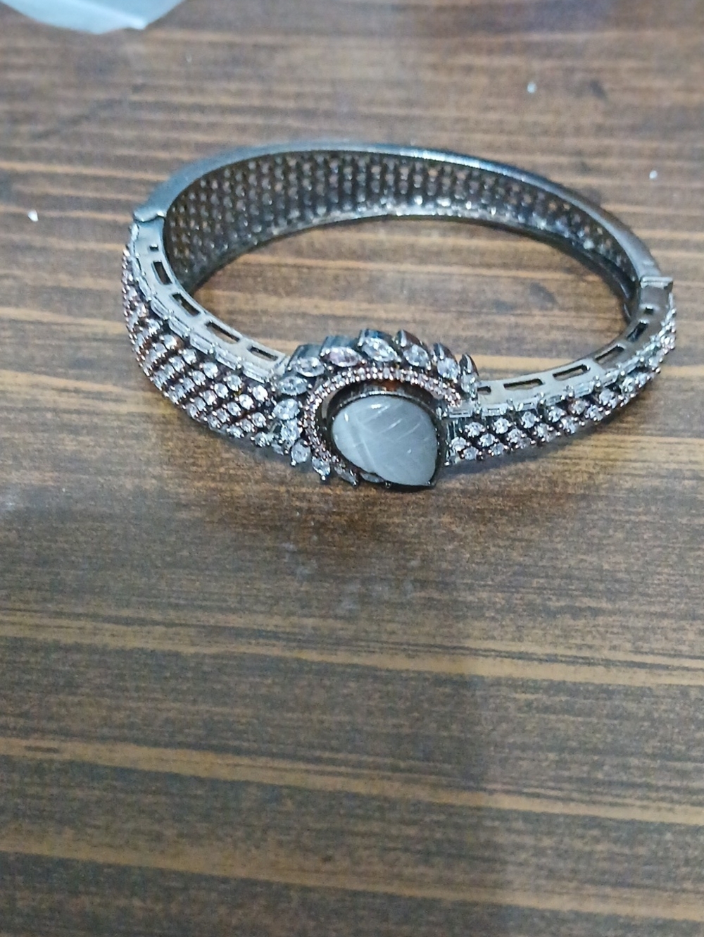 Elegant Silver-Tone Crystal Bangle Bracelet with Gray Center Stone